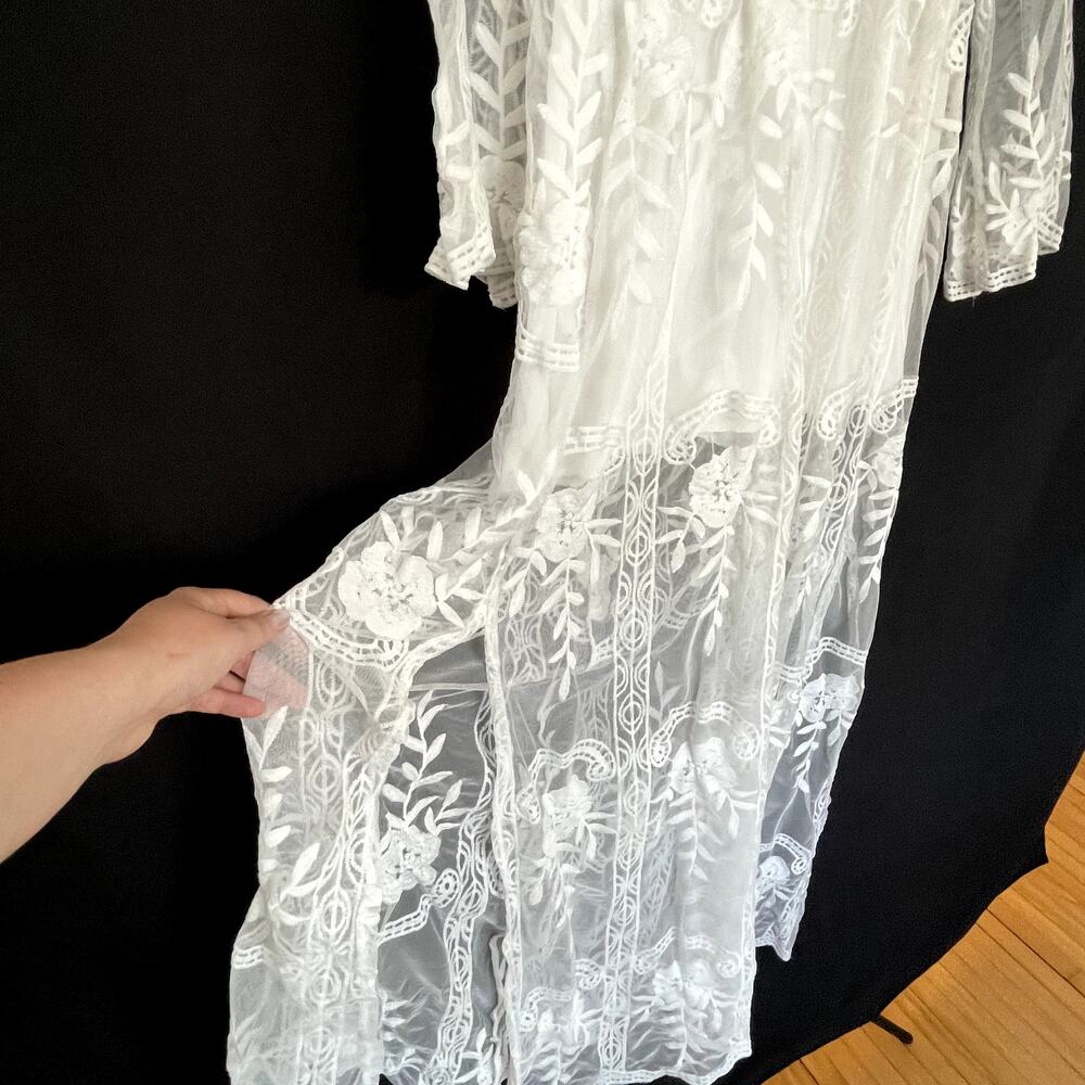 Elegant White Embroidered Maxi Dress with V-Neck - Picture 4 of 11